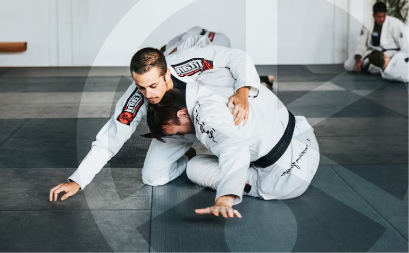 Learning jiu-jitsu in a gym